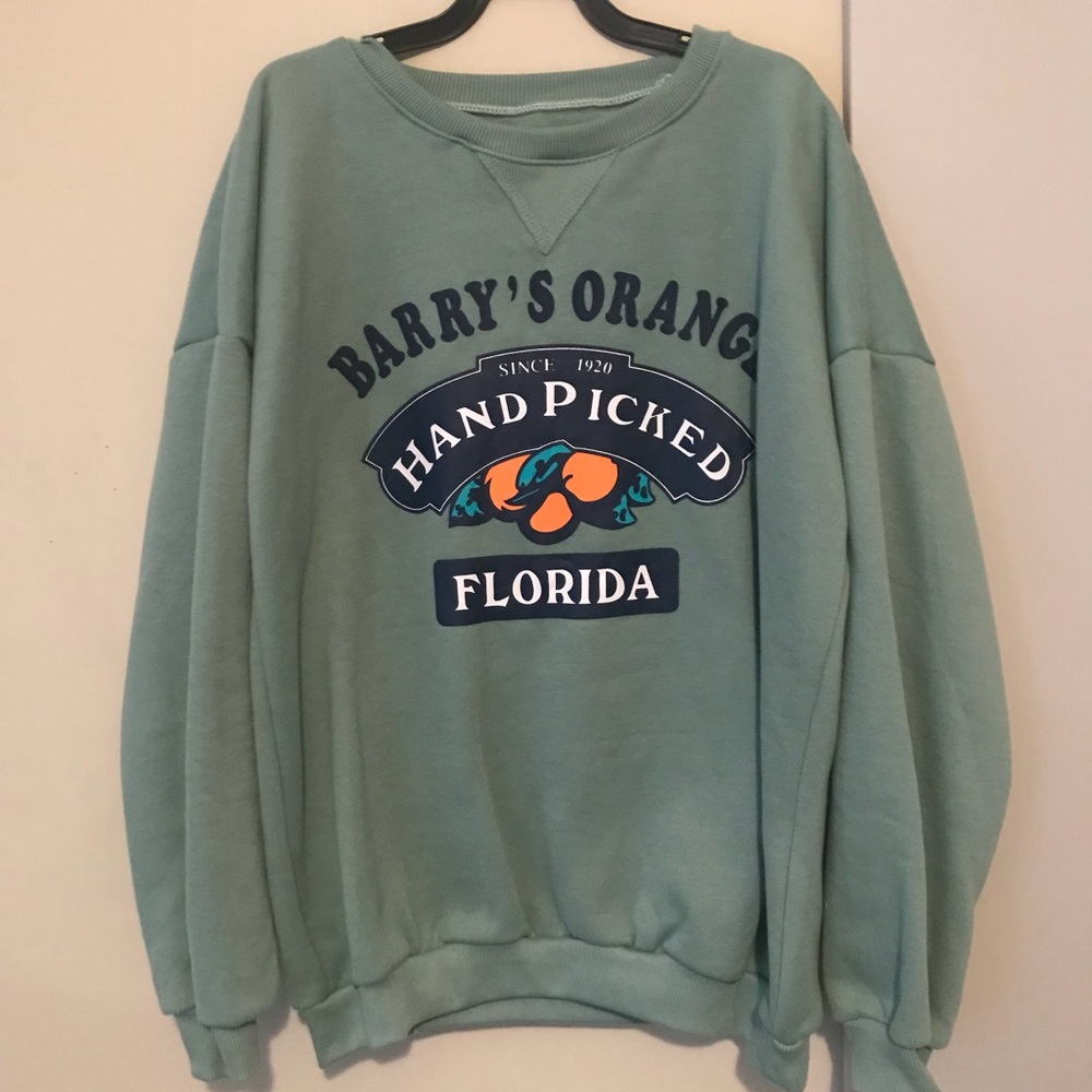 green sweatshirt